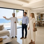 Foreign Buyer Reviewing Freehold Property Options In Oman At A Modern Coastal Residential Development Near Muscat